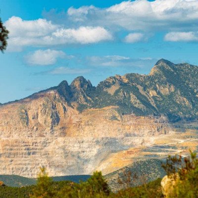 Scenic view of Zaghouan mountains and lush green forest under a blue sky.